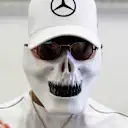 AUTODROMO HERMANOS RODRIGUEZ, MEXICO - OCTOBER 28: Lewis Hamilton, Mercedes AMG F1, wearing a skull mask, signs autographs for young fans during the Mexican GP at Autodromo Hermanos Rodriguez on October 28, 2018 in Autodromo Hermanos Rodriguez, Mexico. (Photo by Steven Tee / LAT Images)