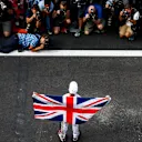 AUTODROMO HERMANOS RODRIGUEZ, MEXICO - OCTOBER 28: Lewis Hamilton, Mercedes AMG F1, with Union flag draped across his shoulders, celebrates with his team after securing a 5th world drivers championship title during the Mexican GP at Autodromo Hermanos Rodriguez on October 28, 2018 in Autodromo Hermanos Rodriguez, Mexico. (Photo by Glenn Dunbar / LAT Images)