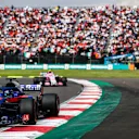 AUTODROMO HERMANOS RODRIGUEZ, MEXICO - OCTOBER 28: Brendon Hartley, Toro Rosso STR13, leads Esteban Ocon, Racing Point Force India VJM11 during the Mexican GP at Autodromo Hermanos Rodriguez on October 28, 2018 in Autodromo Hermanos Rodriguez, Mexico. (Photo by Zak Mauger / LAT Images)