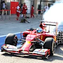 Fernando Alonso (ESP) Ferrari and smoke. Formula One Testing, Day One, Bahrain International Circuit, Sakhir, Bahrain, Wednesday, 19 February 2014 © Sutton Images. No reproduction without permission