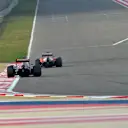 Fernando Alonso (ESP) Ferrari F14 T leads Jean-Eric Vergne (FRA) Scuderia Toro Rosso STR9. Formula One Testing, Day Two, Bahrain International Circuit, Sakhir, Bahrain, Friday, 28 February 2014 © Sutton Images. No reproduction without permission