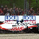 IMOLA, ITALY - APRIL 24: Mick Schumacher of Germany driving the (47) Haas F1 VF-22 Ferrari runs wide at the start during the F1 Grand Prix of Emilia Romagna at Autodromo Enzo e Dino Ferrari on April 24, 2022 in Imola, Italy. (Photo by Mark Thompson/Getty Images)