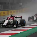 Kimi Raikkonen, Alfa Romeo Racing C39, leads Kevin Magnussen, Haas VF-20