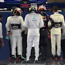 Kevin Magnussen (DEN) McLaren, Lewis Hamilton (GBR) Mercedes AMG F1, Daniel Ricciardo (AUS) Red Bull Racing and Jenson Button (GBR) McLaren get weighed in parc ferme. Formula One World Championship, Rd15, Japanese Grand Prix, Qualifying, Suzuka, Japan © Sutton Images. No reproduction without permission