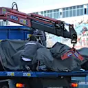 The crashed car of Adrian Sutil (GER) Sauber C33 is recovered on a truck. Formula One Testing, Jerez, Spain, Day Three, Thursday, 30 January 2014 © Sutton Images. No reproduction without permission