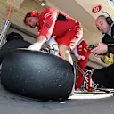 Ferrari and Pirelli engineer and Pirelli tyre. Formula One World Championship, Rd17, United States Grand Prix, Qualifying, Austin, Texas, USA, Saturday, 1 November 2014 © Sutton Images. No reproduction without permission