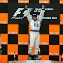 Juan Pablo Montoya (COL) Williams on the podium. Formula One World Championship, Rd18, Brazilian Grand Prix, Race Day, Interlagos, Brazil, 24 October 2004 