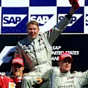 Michael Schumacher (GER) Ferrari F1 2001, Mika Hakkinen(FIN) McLaren Mercedes MP4-16, David Coulthard(GBR) McLaren Mercedes MP4-16 United States Grand Prix, Indianapolis 30 September 2001. World © Bearne/Sutton © No reproduction without permission.