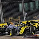 Romain Grosjean (FRA) Haas F1 Team VF-19 andf Nico Hulkenberg (GER) Renault F1 Team RS19 battle for position.
22.09.2019. Formula 1 World Championship, Rd 15, Singapore Grand Prix, Marina Bay Street Circuit, Singapore, Race Day.
 - www.xpbimages.com, EMail: requests@xpbimages.com - copy of publication required for printed pictures. Every used picture is fee-liable. © Copyright: Dungan / XPB Images