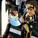 Vitaly Petrov (RUS) Lotus Renault GP celebrates his third position on the podium. Formula One World Championship, Rd 1, Australian Grand Prix, Race, Albert Park, Melbourne, Australia, Sunday, 27 March 2011 © Sutton Images. No reproduction without permission
