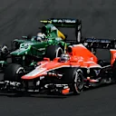 Giedo van der Garde (NDL) Caterham CT03 battles with Jules Bianchi (FRA) Marussia F1 Team MR02. Formula One World Championship, Rd10, Hungarian Grand Prix, Race Day, Hungaroring, Hungary. Sunday, 28 July 2013 © © Sutton Images