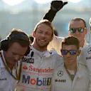 Jenson Button (GBR) McLaren and mechanics on the grid. Formula One World Championship, Rd19, Abu Dhabi Grand Prix, Race, Yas Marina Circuit, Abu Dhabi, UAE, Sunday, 23 November 2014 