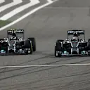 Lewis Hamilton (GBR) Mercedes AMG F1 W05 and Nico Rosberg (GER) Mercedes AMG F1 W05 battle. Formula One World Championship, Rd3, Bahrain Grand Prix, Race, Bahrain International Circuit, Sakhir, Bahrain, Sunday, 6 April 2014 