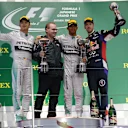 (L to R): Nico Rosberg (GER) Mercedes AMG F1, Peter Hodgkinson (GBR) Mercedes AMG F1 Head of Build, race winner Lewis Hamilton (GBR) Mercedes AMG F1 and Daniel Ricciardo (AUS) Red Bull Racing RB10 on the podium. Formula One World Championship, Rd15, Japanese Grand Prix, Race, Suzuka, Japan, Sunday 5 October 2014. Sutton Images