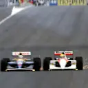 Race winner Nigel Mansell (GBR) Williams FW14 (left) and Ayrton Senna (BRA) McLaren MP4/6 drive wheel to wheel whilst fighting for the lead.
Spanish Grand Prix, Barcelona, 29 September 1991.
 © Sutton Motorsport Images