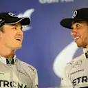 Nico Rosberg (GER) Mercedes AMG F1 and Lewis Hamilton (GBR) Mercedes AMG F1 on the podium. Formula One World Championship, Rd3, Bahrain Grand Prix, Race, Bahrain International Circuit, Sakhir, Bahrain, Sunday, 6 April 2014