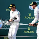 Lewis Hamilton (GBR) and Nico Rosberg (GER) on the podium. Formula One World Championship, Rd1, Australian Grand Prix, Race, Albert Park, Melbourne, Australia, Sunday 15 March 2015. © Sutton Motorsport Images