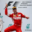 Race winner Sebastian Vettel (GER) Ferrari celebrates on the podium at Formula One World Championship, Rd2, Malaysian Grand Prix, Race, Sepang, Malaysia, Sunday 29 March 2015. © Sutton Motorsport Images