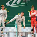 (L to R): Nico Rosberg (GER) Mercedes AMG F1, race winner Lewis Hamilton (GBR) Mercedes AMG F1 and Sebastian Vettel (GER) Ferrari celebrate on the podium at Formula One World Championship, Rd3, Chinese Grand Prix, Race, Shanghai, China, Sunday 12 April 2015. © Sutton Motorsport Images