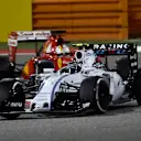 Valtteri Bottas (FIN) Williams FW37 and Sebastian Vettel (GER) Ferrari SF15-T at Formula One World Championship, Rd4, Bahrain Grand Prix Race, Bahrain International Circuit, Sakhir, Bahrain, Sunday 19  April 2015. © Sutton Motorsport Images