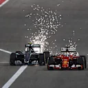Nico Rosberg (GER) Mercedes AMG F1 W06 overtkes Sebastian Vettel (GER) Ferrari SF15-T at Formula One World Championship, Rd4, Bahrain Grand Prix Race, Bahrain International Circuit, Sakhir, Bahrain, Sunday 19  April 2015. © Sutton Motorsport Images