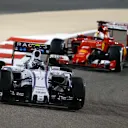 Valtteri Bottas (FIN) Williams FW37 and Sebastian Vettel (GER) Ferrari SF15-T at Formula One World Championship, Rd4, Bahrain Grand Prix Race, Bahrain International Circuit, Sakhir, Bahrain, Sunday 19  April 2015. © Sutton Motorsport Images