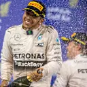 Lewis Hamilton (GBR) Mercedes AMG F1 and Nico Rosberg (GER) Mercedes AMG F1 celebrates on the podium at Formula One World Championship, Rd4, Bahrain Grand Prix Race, Bahrain International Circuit, Sakhir, Bahrain, Sunday 19  April 2015. © Sutton Motorsport Images