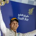 Nico Rosberg (GER) Mercedes AMG F1 with the trophy on the podium at Formula One World Championship, Rd4, Bahrain Grand Prix Race, Bahrain International Circuit, Sakhir, Bahrain, Sunday 19  April 2015. © Sutton Motorsport Images