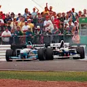 Damon Hill (Williams FW17 Renault) and Michael Schumacher (Benetton B195 Renault) collide on lap 46 at Silverstone. ©Sutton Motorsport Images