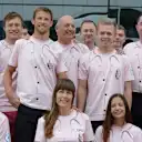 Jenson Button (GBR) McLaren and the McLaren team in their pink shirts in memory of John Button (GBR) #PinkForPapa
Formula One World Championship, Rd9, British Grand Prix, Race Day, Silverstone, England, Sunday 6 July 2014. © Sutton Motorsport Images