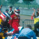 Even the marshals were cheering when Jean Alesi (Ferrari) arrived back in parc ferme aboard Michael Schumacher's car. 1995 Canadian Grand Prix.
Montreal, Quebec, Canada. 9-11 June 1995. © LAT Photographic