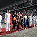 Drivers observe the National Anthem on the grid at Formula One World Championship, Rd3, Chinese Grand Prix, Race, Shanghai, China, Sunday 12 April 2015. © Sutton Motorsport Images