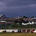 Senna follows the ongoing battle between Damon Hill and Eddie Irvine. © Sutton Motorsport Images