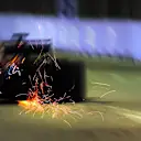 Like any street track, the surface in Singapore is not particularly smooth, contributing to many sparky moments like this. © Sutton Motorsport Images