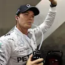 For the drivers, such as Nico Rosberg, re-hydration begins the moment they step out of the car. Singapore, 2014. © Sutton Motorsport Images