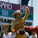 Fair Park, Dallas, Texas, USA. 6-8 July 1984. Keke Rosberg (Williams Honda) 1st position, Elio de Angelis (Team Lotus) 2nd position and Rene Arnoux (Ferrari) 3rd position on the podium. Copyright - LAT Photographic