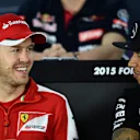 Sebastian Vettel (GER) Ferrari and Lewis Hamilton (GBR) Mercedes AMG F1 during the press conference at Formula One World Championship, Rd1, Australian Grand Prix, Preparations, Albert Park, Melbourne, Australia, Thursday 12 March 2015. © Sutton Motorsport Images