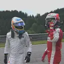 McLaren's Fernando Alonso and Ferrari's Kimi Raikkonen collide on the opening lap in Austria © FOWC Ltd