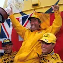An overjoyed Eddie Jordan (centre) is hoisted aloft by his first Jordan race winner Damon Hill (GBR) (left) and second place finisher Ralf Schumacher (GER) (right).
Formula One World Championship, Rd 13, Belgian Grand Prix, Spa Francorchamps, Belgium, 30 August 1998

 © Sutton Motorsport Images