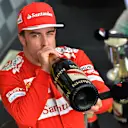 Second placed finisher Fernando Alonso (ESP) Ferrari drinks champagne On the podium.
Formula One World Championship, Rd11, Hungarian Grand Prix, Race Day, Hungaroring, Hungary. Sunday 27 July 2014.