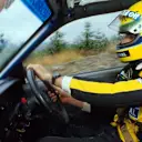 Ayrton Senna slides a Ford Sierra through a Welsh rally stage in 1986