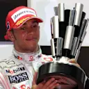 Lewis Hamilton (GBR) McLaren celebrates on the podium 
Formula One World Championship, Rd 15, Singapore Grand Prix, Race, Singapore, Sunday 28 September 2008.

BEST IMAGE © Sutton Motorsport Images