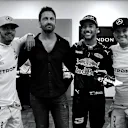 (L to R) Podium finishers Lewis Hamilton, 1st, Mercedes; Daniel Ricciardo, 3rd, Red Bull; Nico Rosberg 2nd, Mercedes, with actor Gerard Butler, 2016 Formula 1 United States Grand Prix, Austin © FOWC Ltd