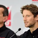 Haas driver Romain Grosjean, with team principal Guenther Steiner in the background © 2015 Getty Images