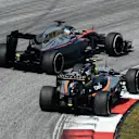 Fernando Alonso (ESP) McLaren MP4-30 and Sergio Perez (MEX) Force India VJM08 bttle at Formula One World Championship, Rd2, Malaysian Grand Prix, Race, Sepang, Malaysia, Sunday 29 March 2015. © Sutton Motorsport Images