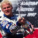 Jacques Villeneuve (CDN) Williams celebrates victory. Formula One World Championship, Hungarian Grand Prix, Rd 11, Budapest, Hungary, 10 August 1997