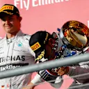 Nico Rosberg (GER) Mercedes AMG F1 and Lewis Hamilton (GBR) Mercedes AMG F1 celebrate on the podium. Formula One World Championship, Rd17, United States Grand Prix, Race, Austin, Texas, USA, Sunday, 2 November 2014