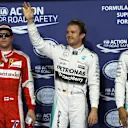 (L to R): Kimi Raikkonen (FIN) Ferrari, pole sitter Nico Rosberg (GER) Mercedes AMG F1 and Lewis Hamilton (GBR) Mercedes AMG F1 celebrate in parc ferme at Formula One World Championship, Rd19, Abu Dhabi Grand Prix, Qualifying, Yas Marina Circuit, Abu Dhabi, UAE, Saturday 28 November 2015. © Sutton Motorsport Images