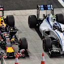 Daniil Kvyat (RUS) Red Bull Racing RB11 and Valtteri Bottas (FIN) Williams FW37 in parc ferme at Formula One World Championship, Rd19, Abu Dhabi Grand Prix, Qualifying, Yas Marina Circuit, Abu Dhabi, UAE, Saturday 28 November 2015. © Sutton Motorsport Images