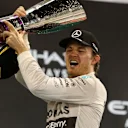 Race winner Nico Rosberg (GER) Mercedes AMG F1 celebrates with the trophy on the podium at Formula One World Championship, Rd19, Abu Dhabi Grand Prix, Race, Yas Marina Circuit, Abu Dhabi, UAE, Sunday 29 November 2015. © Sutton Motorsport Images